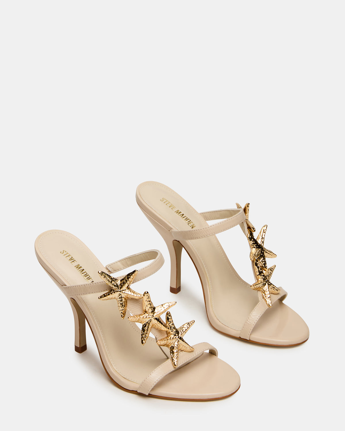 AQUARIAN Bone Star-Detail Round-Toe Mule Women's Heel - Steve Madden