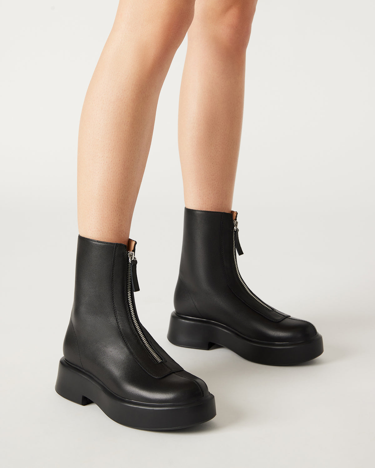 JONES Black Leather Zipper Lug Women's Ankle Boot - Steve Madden