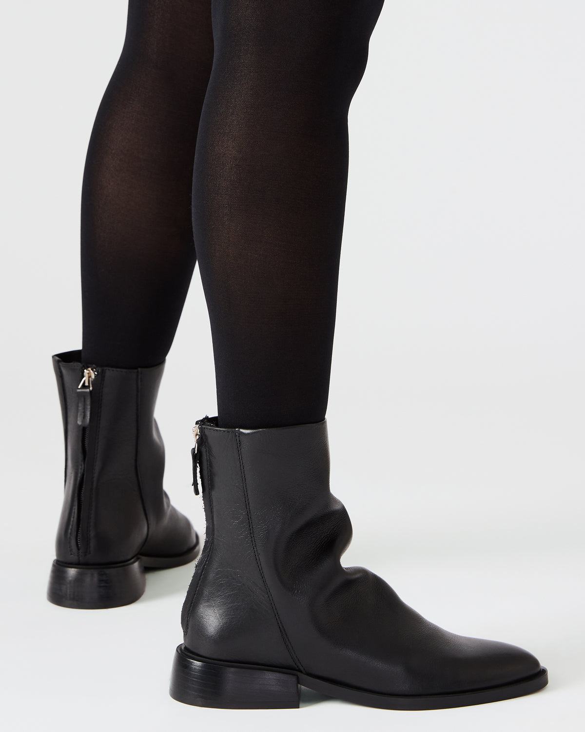 NEXIE Black Leather Women's Pointed-Toe Ankle Boot - Steve Madden