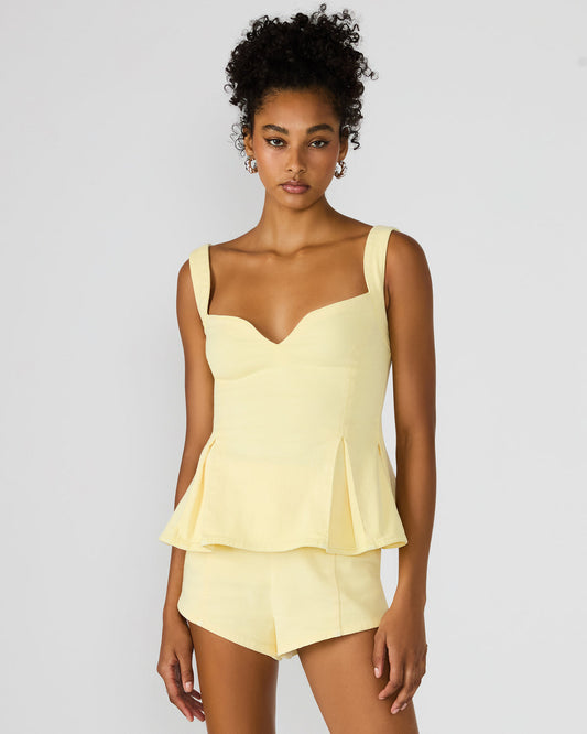 ZENIA Golden Glow Sleeveless Peplum Women's Top - Steve Madden